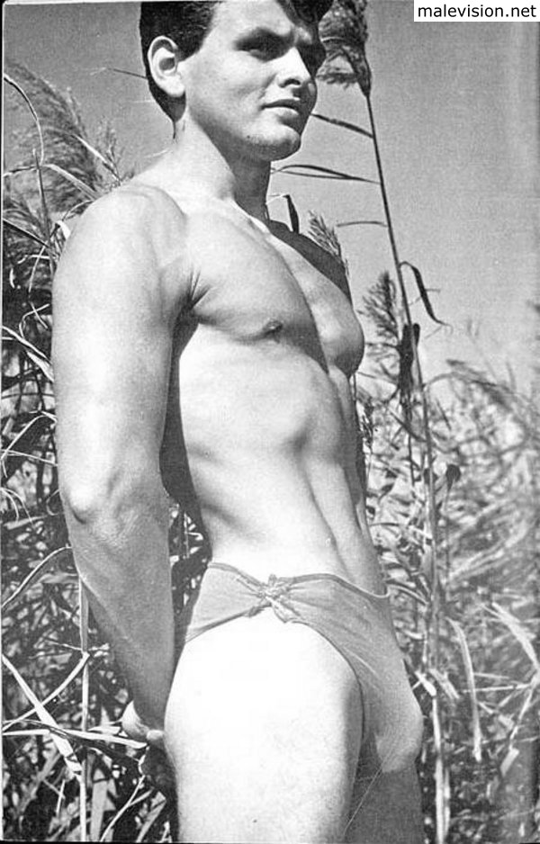 Male vintage physique photography outdoors.