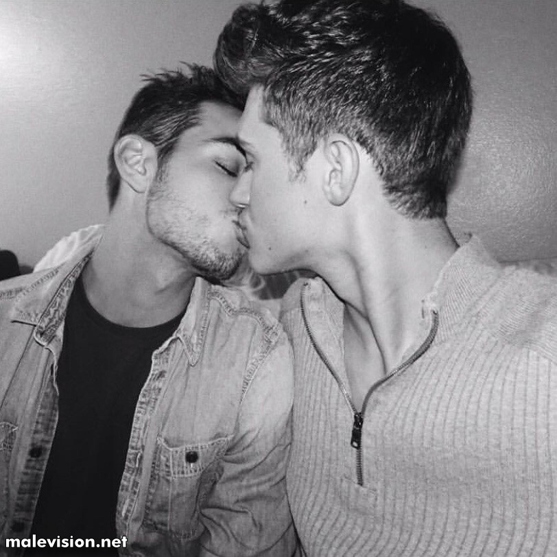 Scott Gardner kisses Jacob Dooley